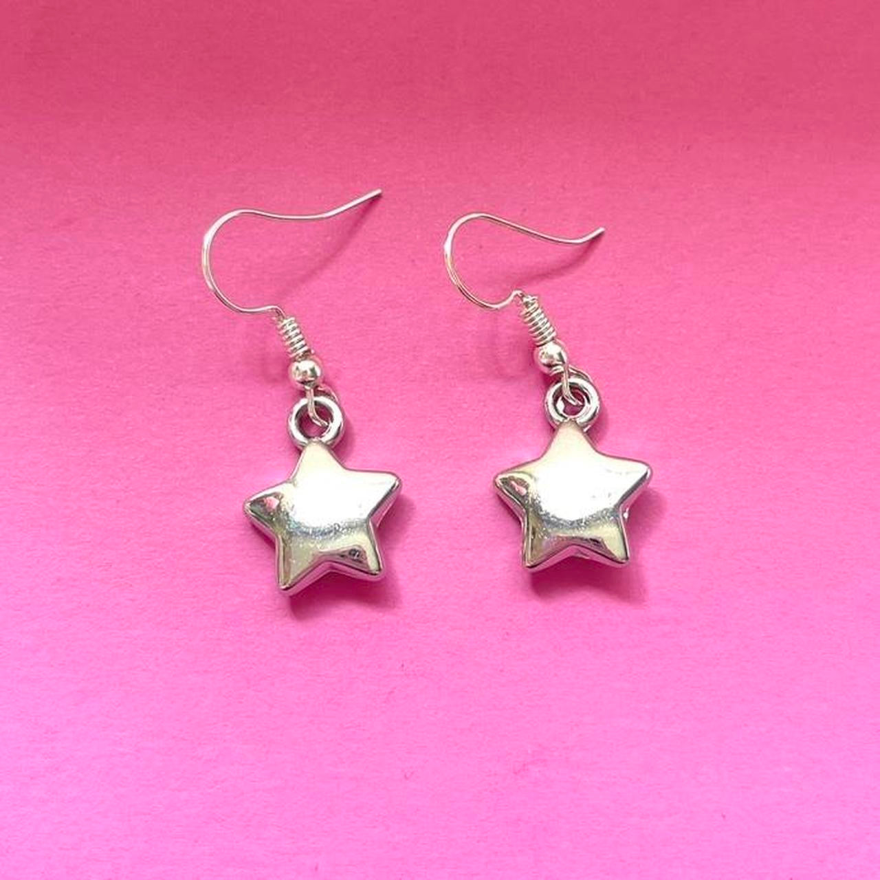 Puff star dangle earrings